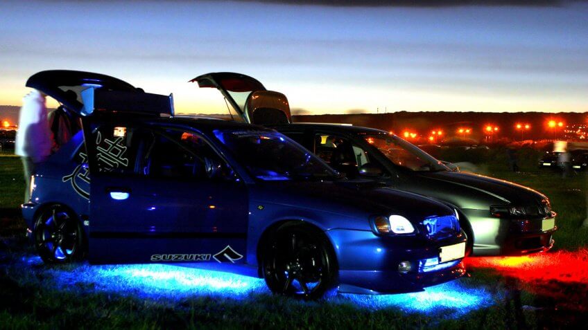 car with neon under body lights