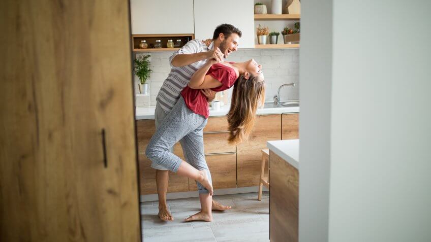 Two Lovers dancing in the kitchen.