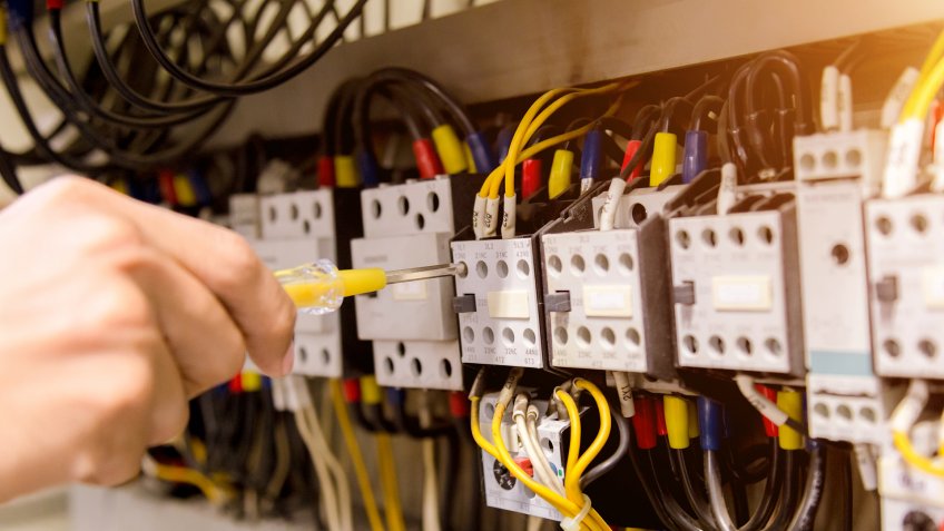 Electrician measurements with multimeter tester System ready.