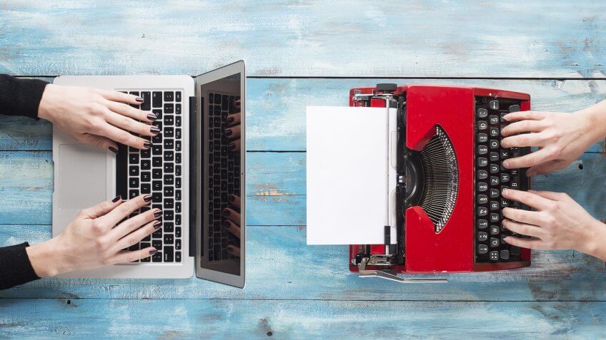 Old typewriter and laptop.