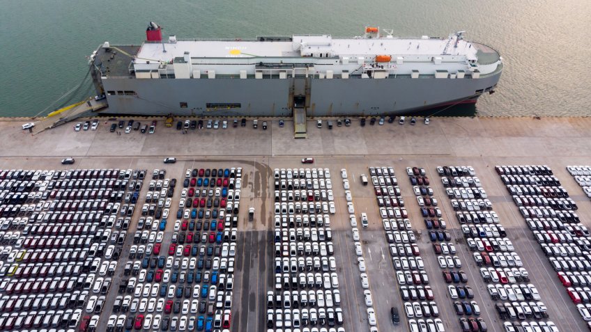 Aerial view cargo ship of business logistic sea freight, New Cars produced by year up in the port for Cargo ship and Cargo import-export around in the world - Image.