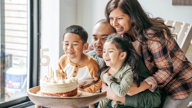 Family celebrating birthday.