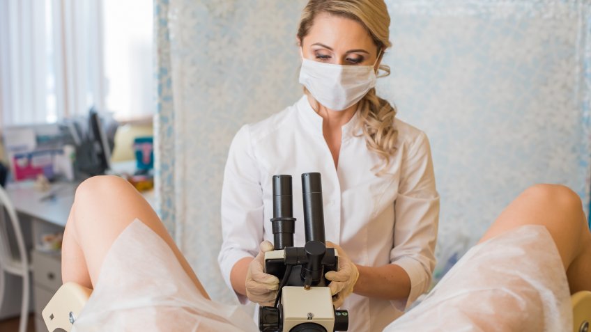 gynecologist with examining patient