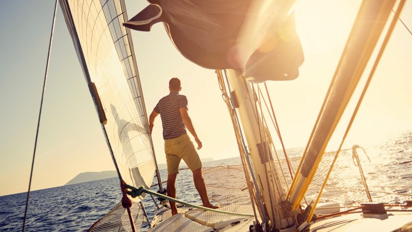 man with luxury yacht lifestyle