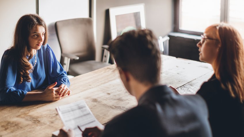 Woman on job interview in modern office.