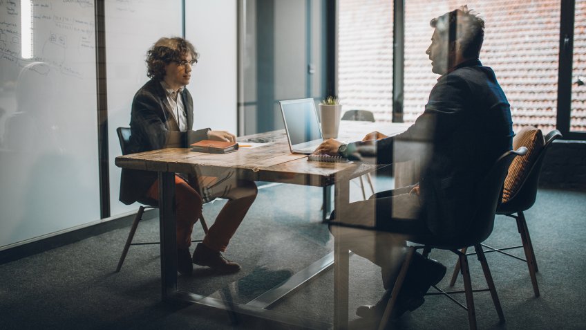 Job interview with candidate in modern office.