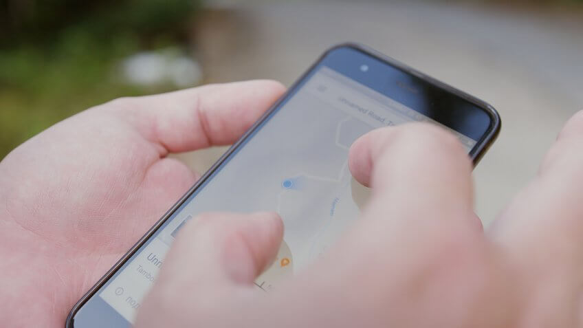 person using Google Maps on smartphone