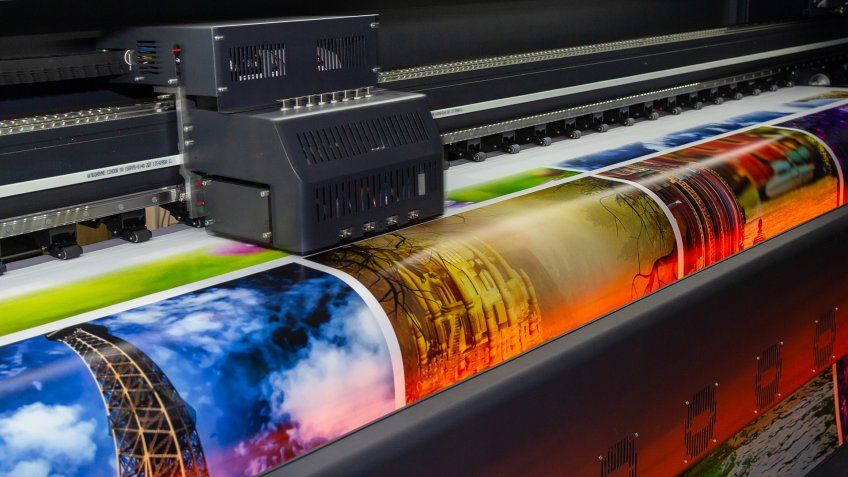 Large format printing machine in operation.
