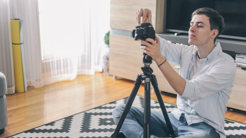 photographer shooting interior of home.