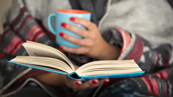 woman reading book