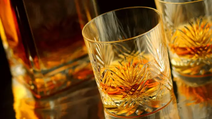 Two crystal glasses filled with single malt whisky.