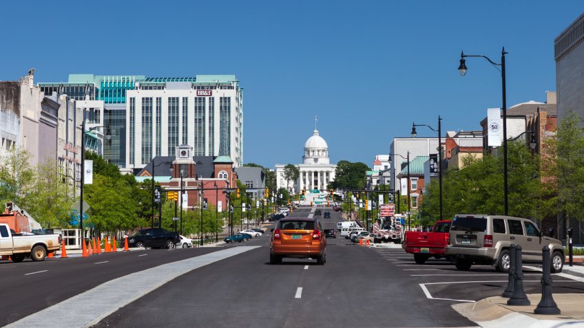 Montgomery, Alabama, USA - April 22, 2015: View of the Alabama State Capitol looking down Dexter Ave.