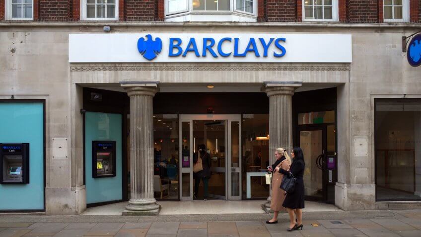London, England - February 04, 2016: People passing by or entering Barclays Bank in Richmond, London.