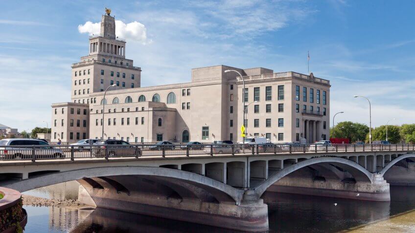 The old Cedar Rapids (Iowa) City Hall sits on an island in the Cedar River.