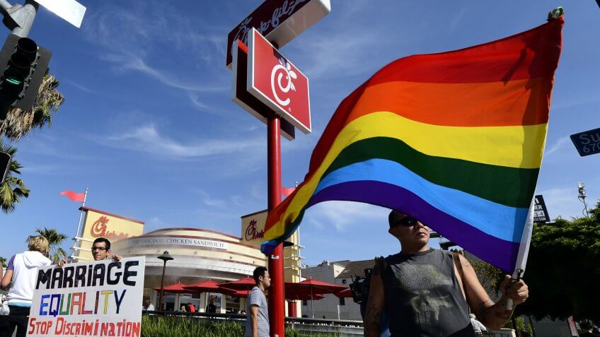 Mandatory Credit: Photo by Paul Buck/EPA/Shutterstock (7756070g)Protesters Hold Banners and Signs in Protest Outside the Chick-fil-a Restaurant in Hollywood California Usa 03 August 2012 the Chain of Fast Food Restaurants Has Come Under Fire After Chick-fil-a Ceo Dan Cathy Made Comments in Support of Traditional Marriage United States HollywoodUsa Chick-fil-a Protest - Aug 2012.