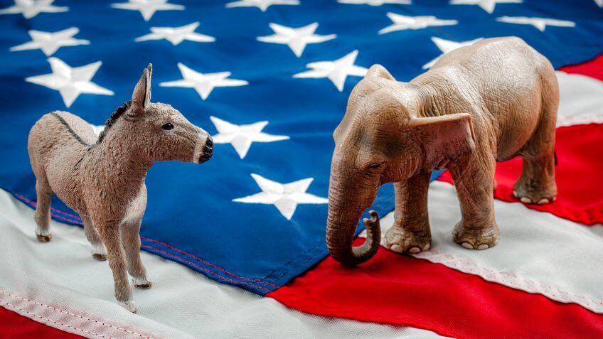 Democrats vs republicans are facing off in a ideological duel on the american flag.