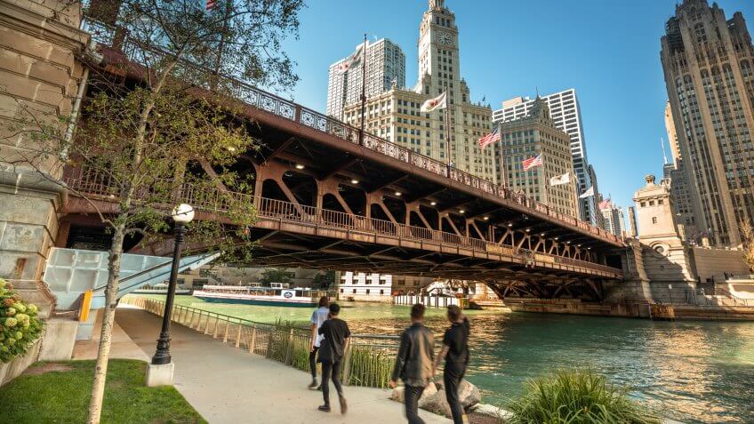 Chicago, Illinois, USA - September 22, 2018: People walk under the DuSable Bridge over the Chicago River in downtown Chicago Illinois USA during a summer day.