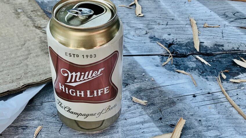marinette, WI/ USA - February 5, 2019: open can of Miller high life beer can be placed on a wooden table.