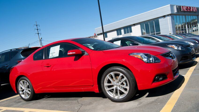 "Halifax, Nova Scotia Canada - March 27, 2011: A new red 2011 Nissan Altima 3.
