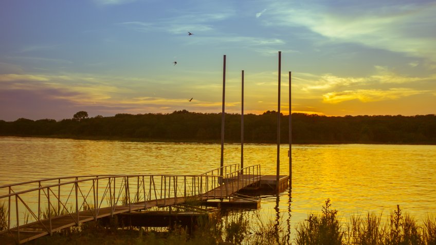 Golden sunset over the port at lake Thunderbird, Norman, Oklahoma - Image.