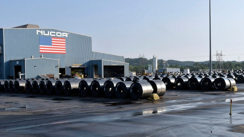 Mandatory Credit: Photo by Timothy D Easley/AP/Shutterstock (9933311c)Rolls of steel are stored outside the rolling facility and await shipment at the NUCOR Steel Gallatin plant, in Ghent, Ky.