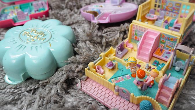Polly Pocket shutterstock_1354816739 March 2019 - Belgium: Collection of Polly Pocket's, miniature dollhouses, that were very popular in the 90's and now are coveted collectables - Image.