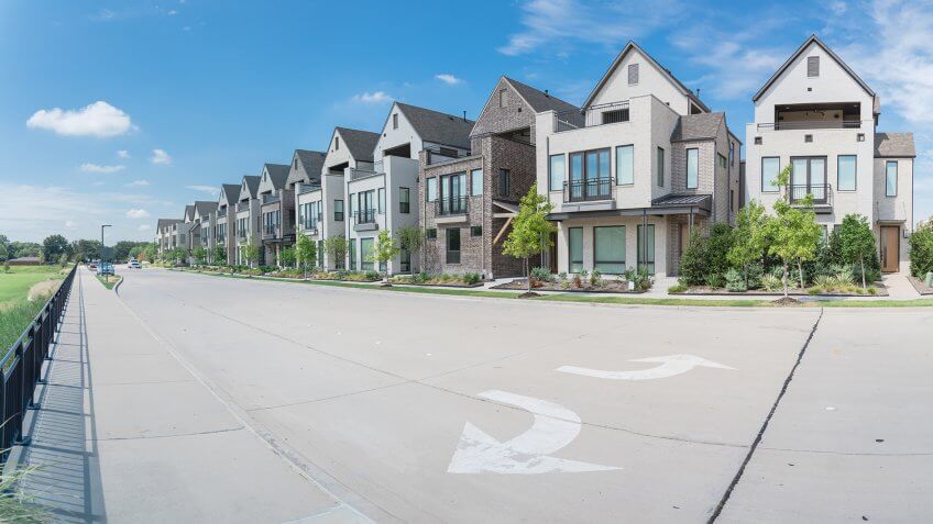 Panorama park side brand new row of three story single family houses in Richardson, North Dallas.