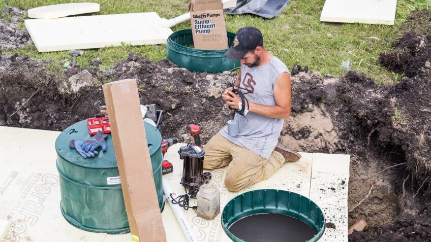 Erskine, USA - June 25, 2018: A new residential mound septic system is being installed.