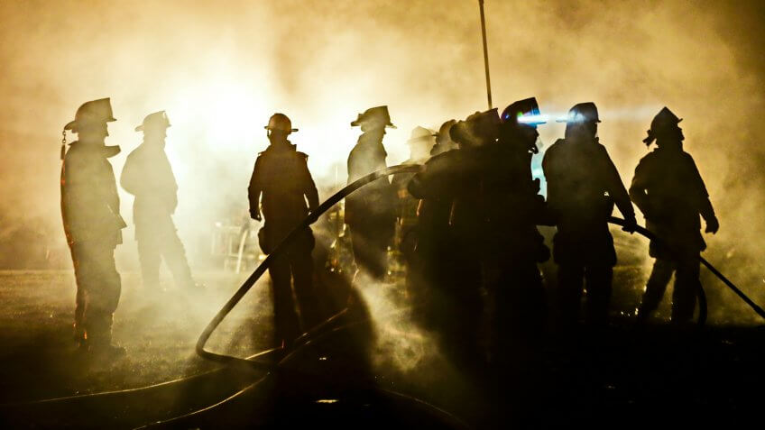 Firefighters working in the shadows on March 7th, 2017 in Klingerstown, PA.