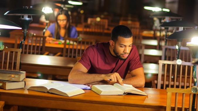 People reading books in the library.