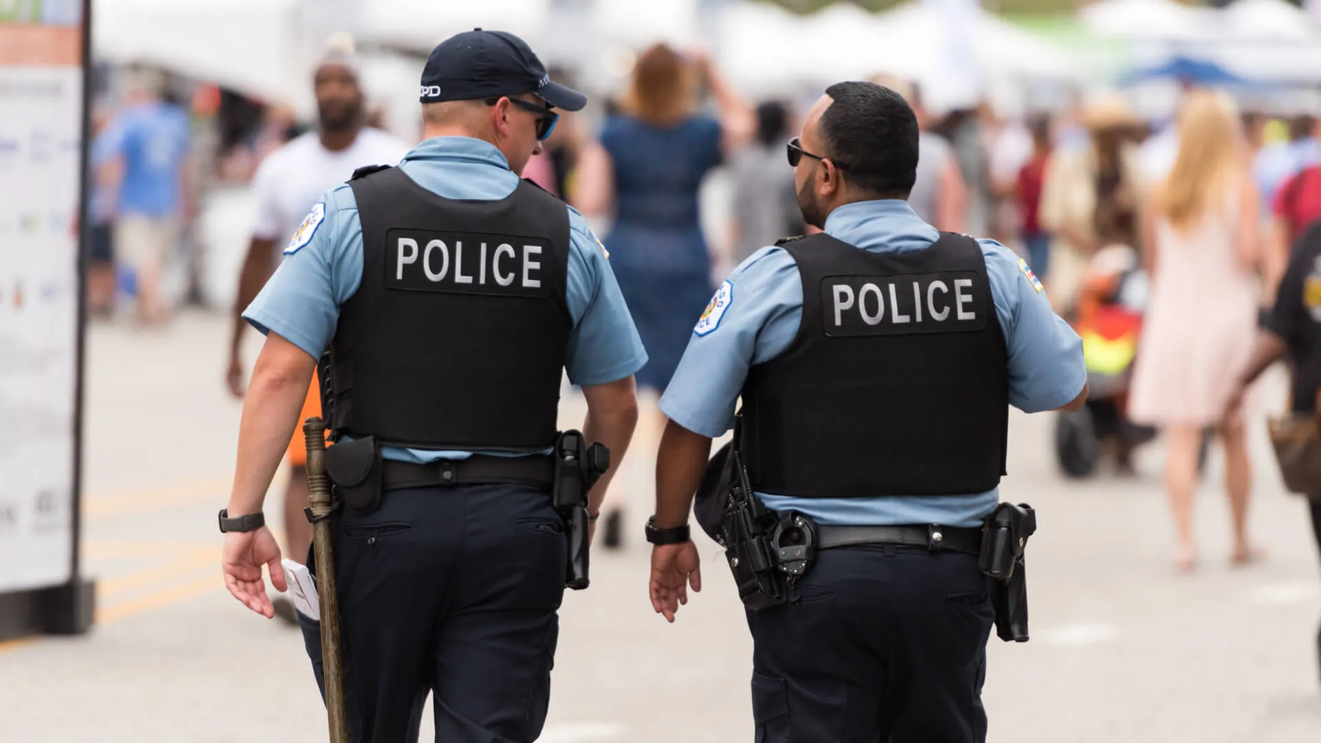 Chicago, USA - Jul 12, 2018: Police at the famous Chicago Taste festival  late in the day in Grant Park.