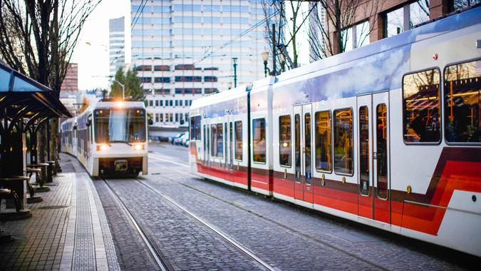 The MAX: Rail train cars coming and going on their tracks in downtown Portland city.