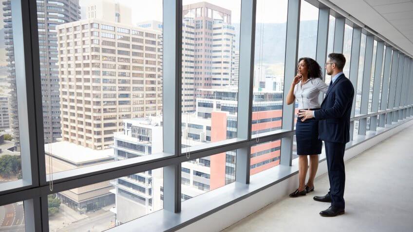 two people looking at commercial real estate