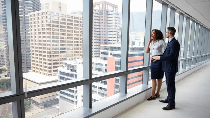 two people looking at commercial real estate