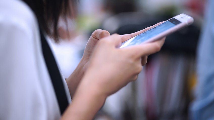 Young Businessman Using Smartphone.