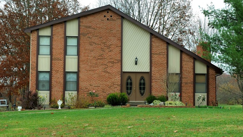 Multi level house in the country in the fall months.