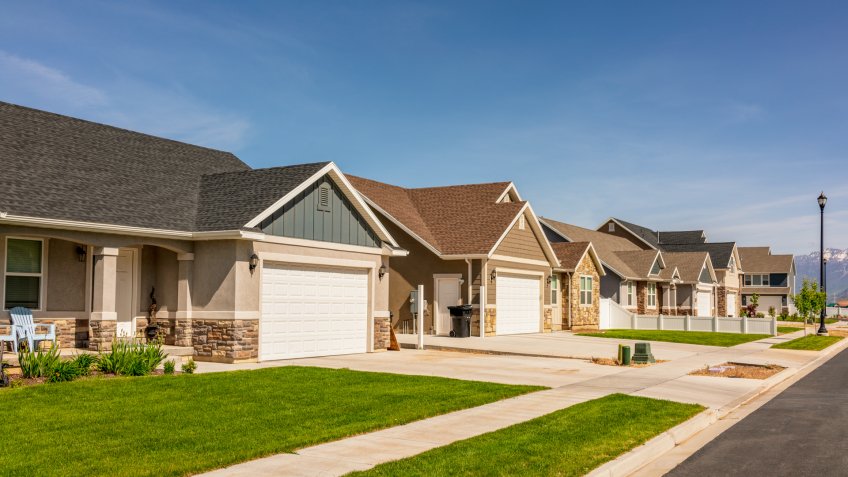 A modern suburban housing development of large detached bungalows in Utah, USA.