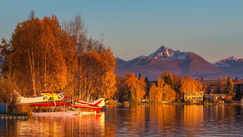 Warm colors of sunset at Spenard Lake in Anchorage.