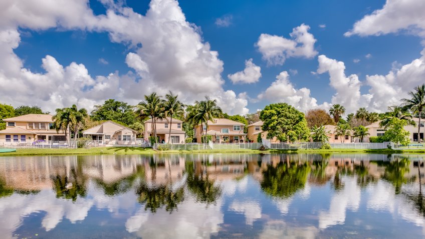 COCONUT CREEK, FL, USA: View of a lake and surrounding homes.