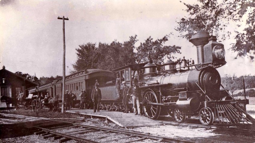 A train at the Saxonville railway station in 1880