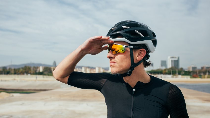 bicyclist looking into distance before his bike ride
