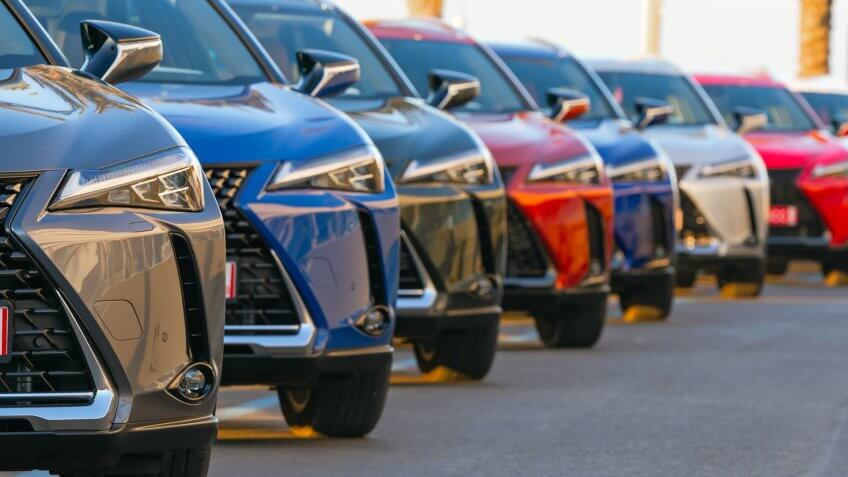 Sitges, Spain - 26th February, 2019: Lexus UX (Toyota Group) SUV vehicles in hybrid version parked on the public parking before the drives.