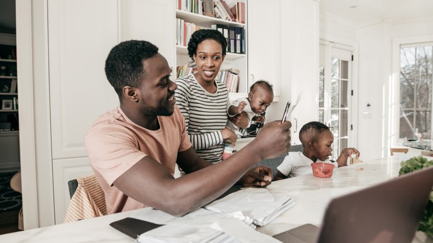 A couple is carefully studying their financial status.