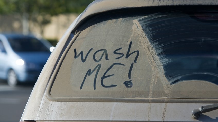 extremely dirty back windshield on car