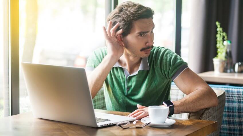 guy listening for secret