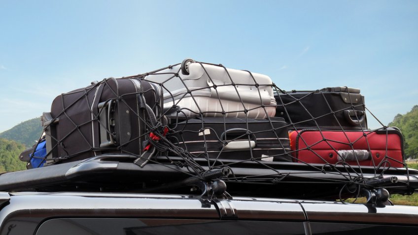 load of luggage on top of car