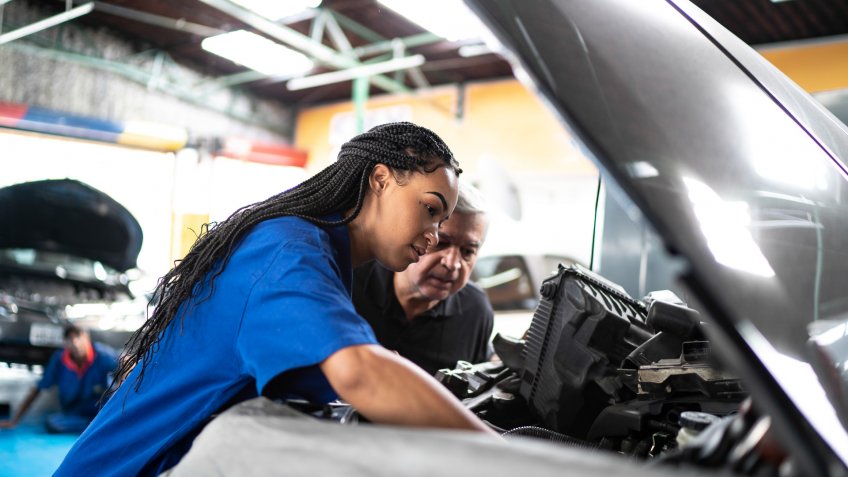 Mechanic partners in a auto repair shopu.