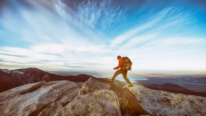 Man climbing and hiking in the California Sierra Nevada mountains.