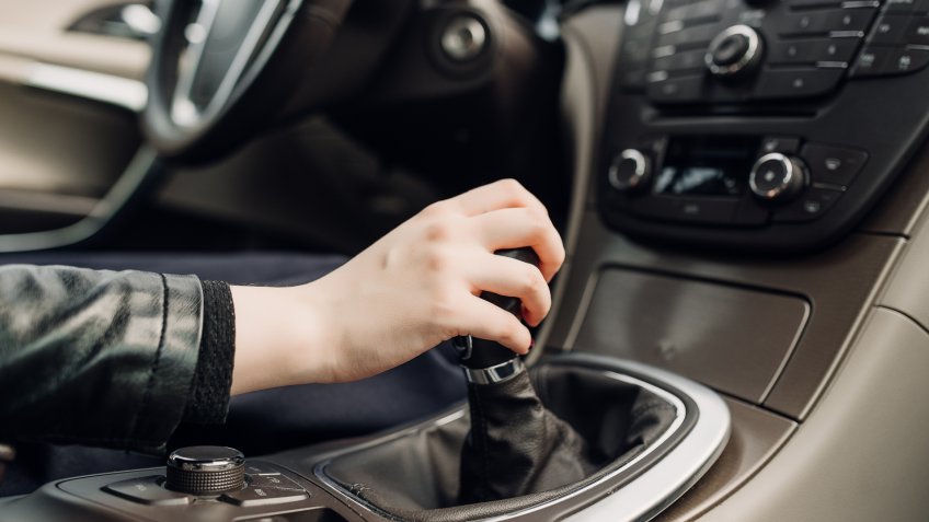 resting hand on stick shift