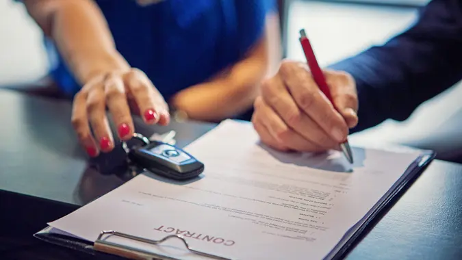 signing to buy used car with cash.